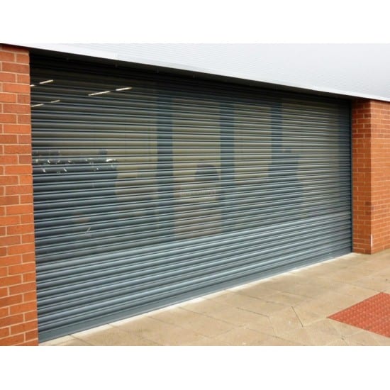 Roller shutter industrial door providing secure and fast access to warehouses, designed to withstand harsh environmental conditions.